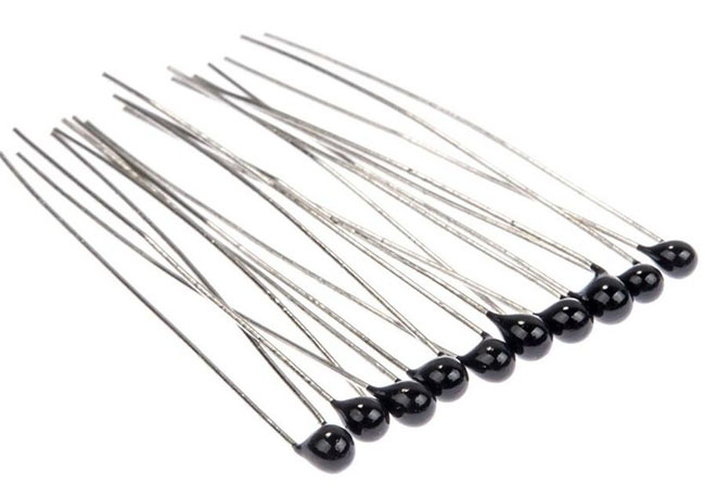 0.1高(gāo)精度NTC熱(rè)敏電(diàn)阻器(qì)（MF52小(xiǎo)黑(hēi)頭NTC）